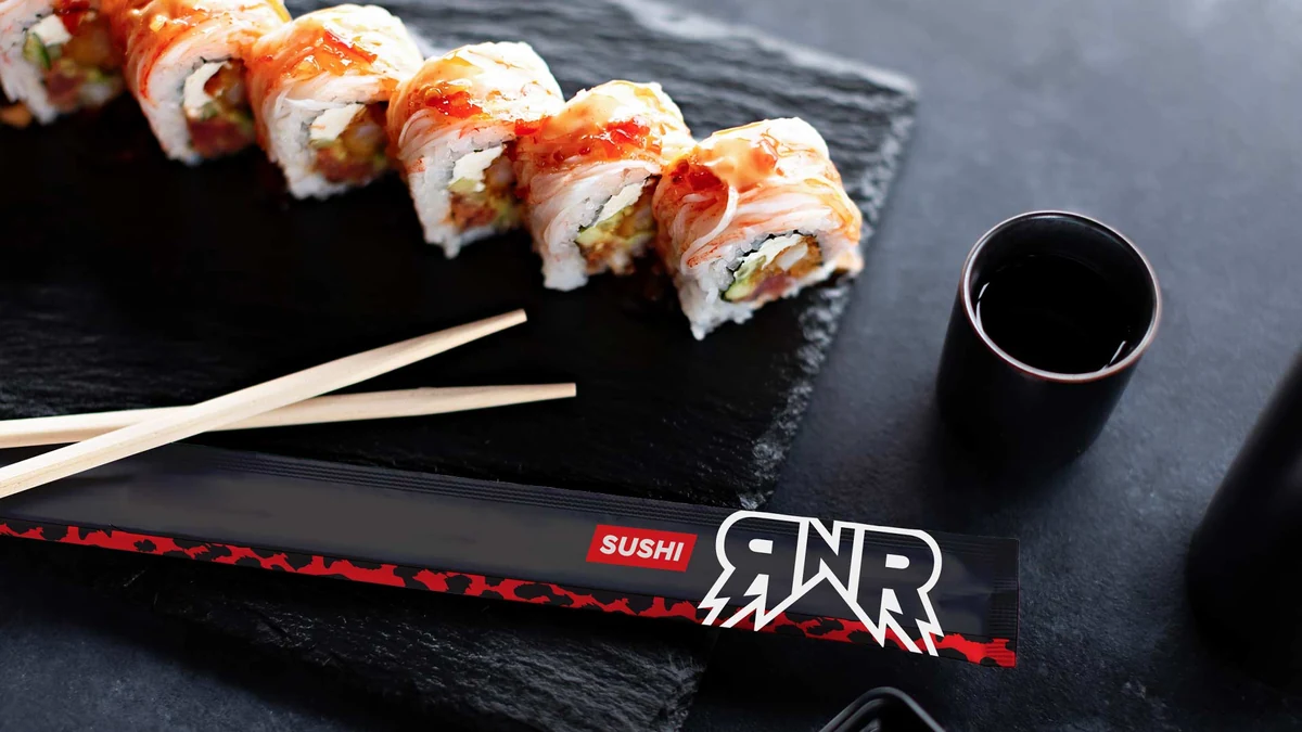 Rock N Roll Sushi rolls served on a branded slate board