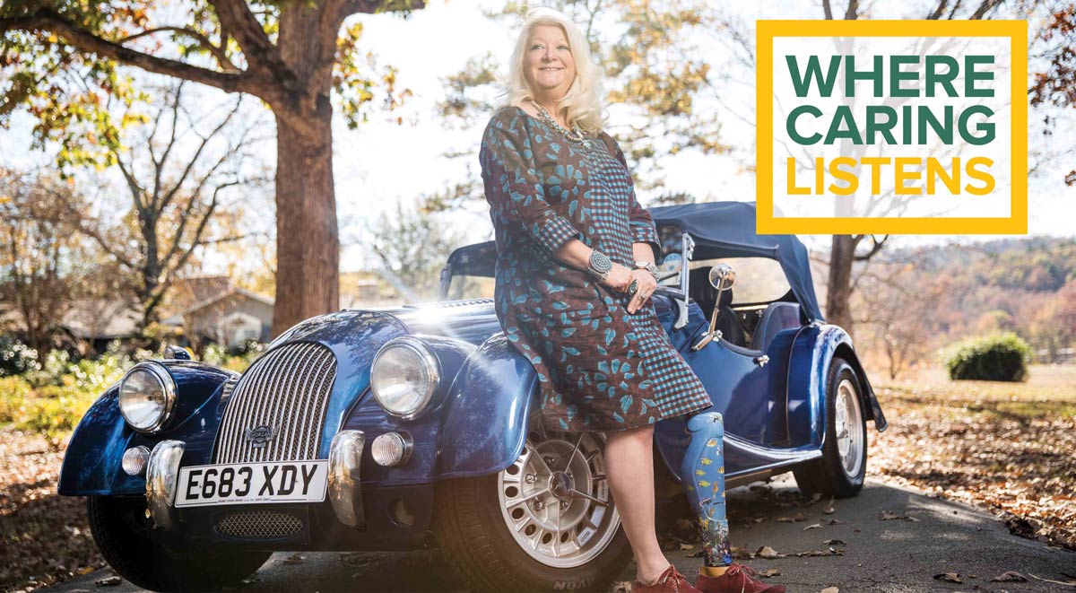 Meet Dena photo of her resting on her classic car with a prosthetic leg